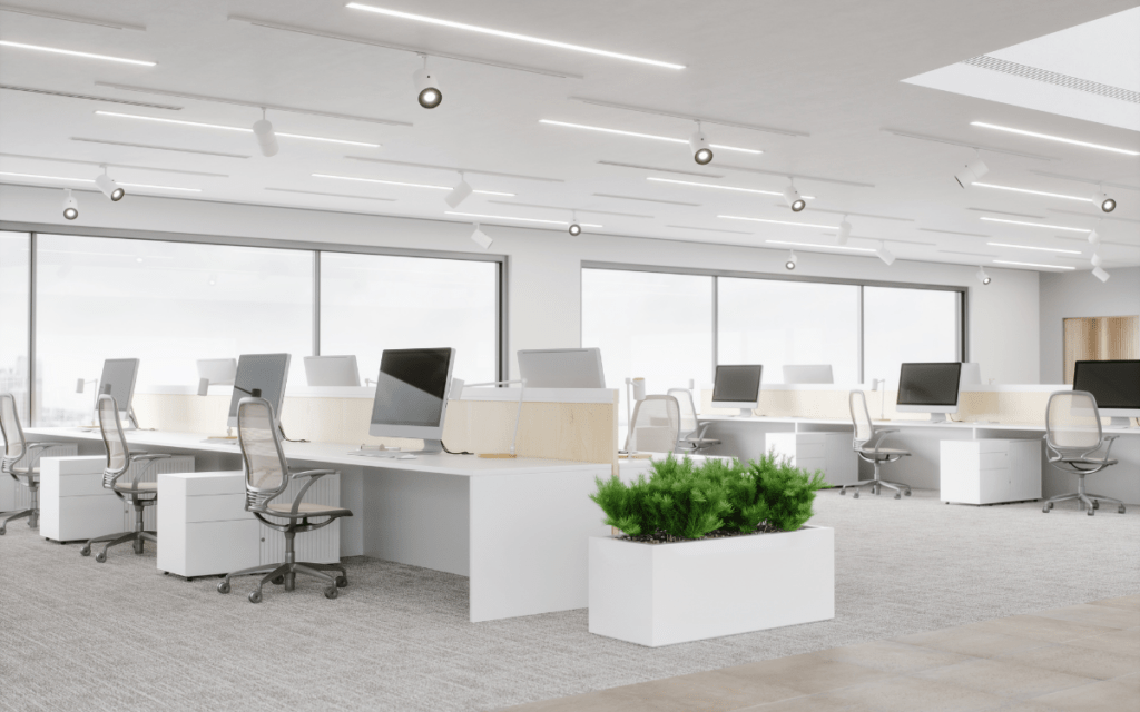 Bureau de direction moderne et soigné, avec surfaces impeccables et espace parfaitement ordonné, illustrant un entretien discret et haut de gamme.
